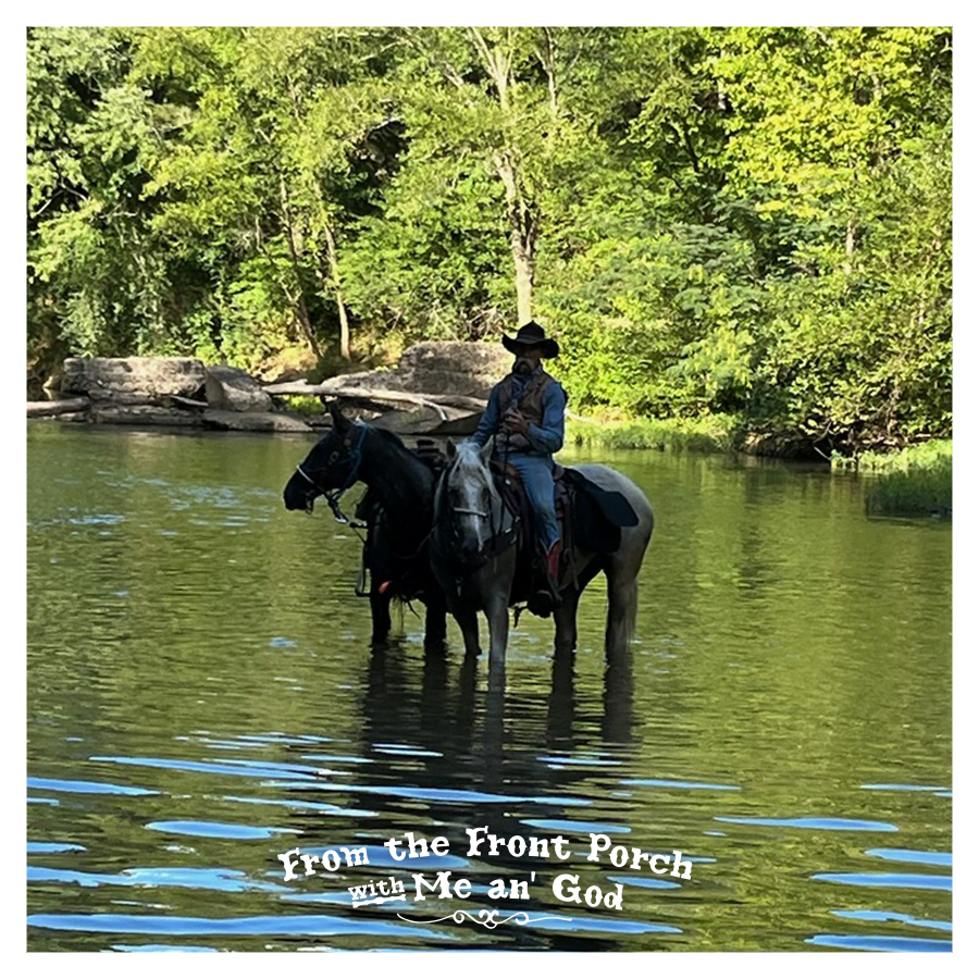 Christian cowboy poet Loren Dean is riding a horse through a stream. A text overlay on the image says "From the Front Porch with Me an' God".